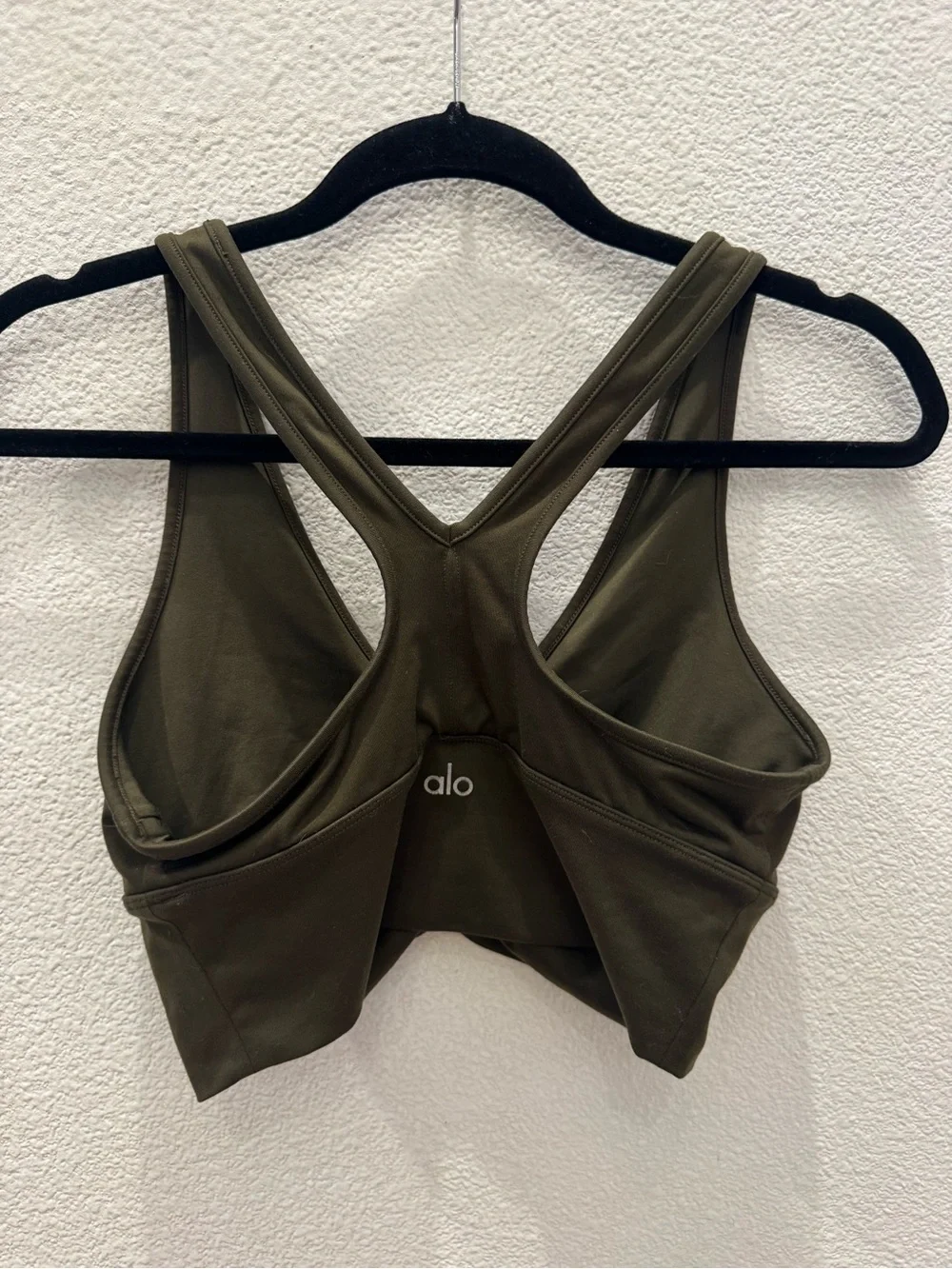 Alo Yoga Wild Thing Bra in dark olive green w/ ruched front V-neck design